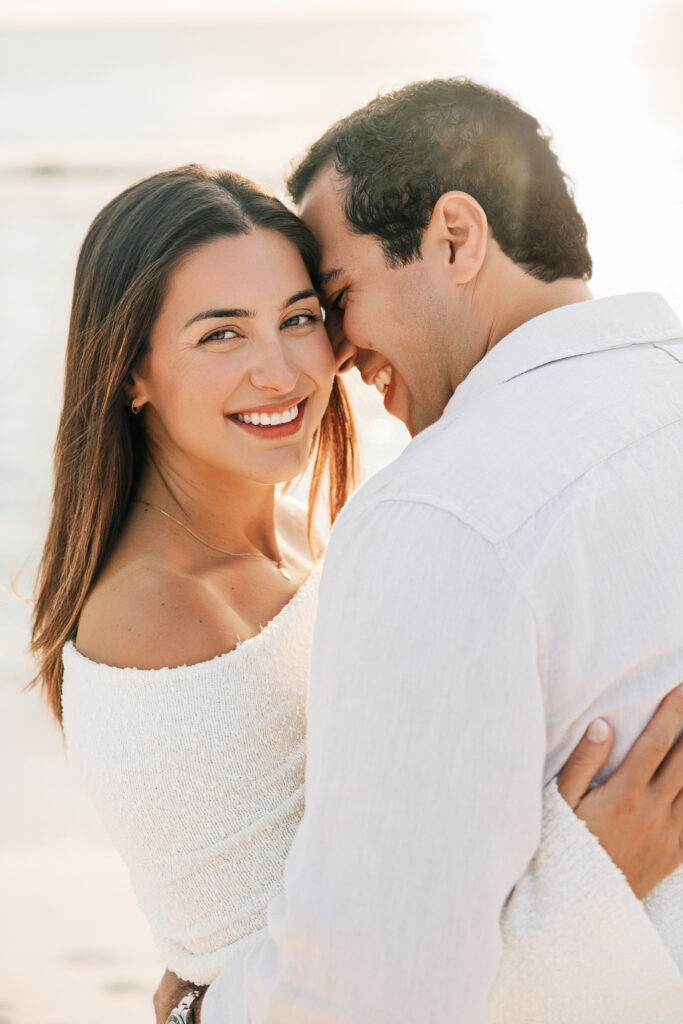 Expecting parents together on a Grand Cayman beach