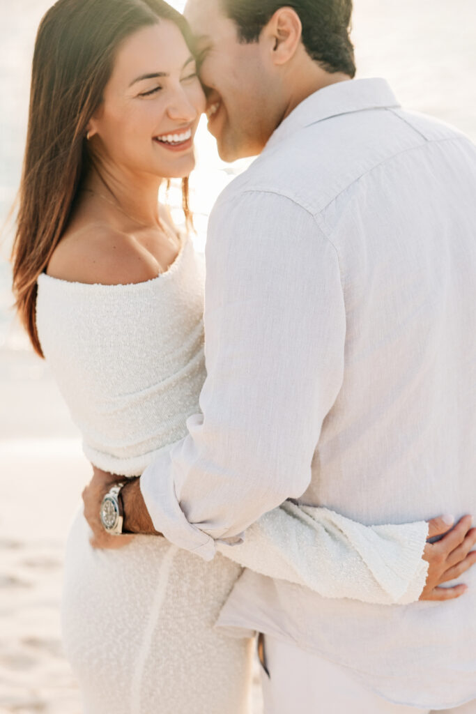 Expecting parents together on a Grand Cayman beach