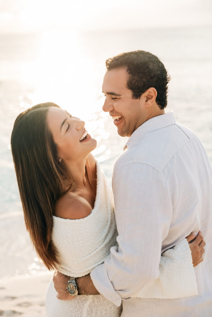 Expecting parents together on a Grand Cayman beach