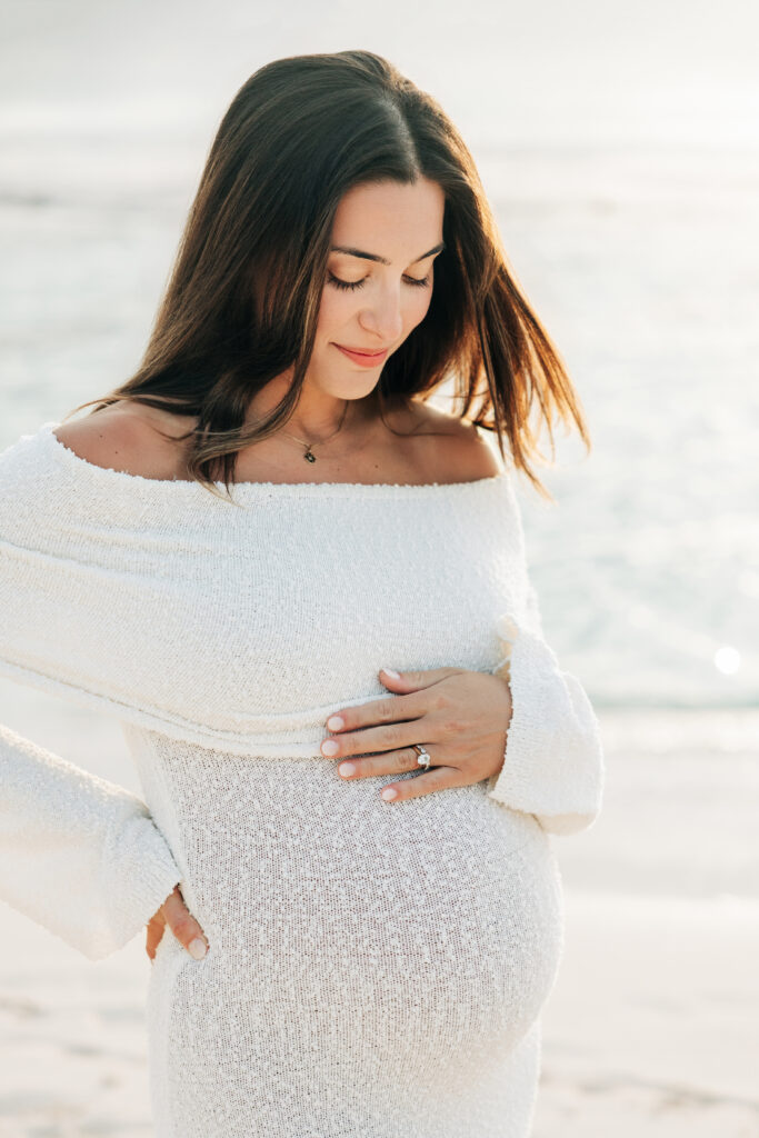 Expecting parents together on a Grand Cayman beach