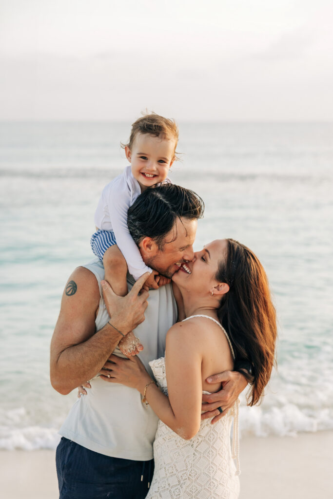 Candid family photography at sunset in the Cayman Islands